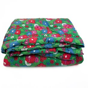 Farverigt blomstret retro vatt�ppe