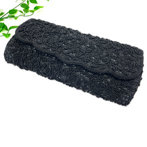 Schwarze Vintage-Clutch mit Perlenstickerei