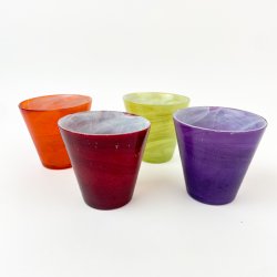 Fire farvede glaskrukker