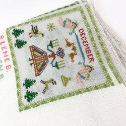 Broderet retro dug med mneder   150 cm