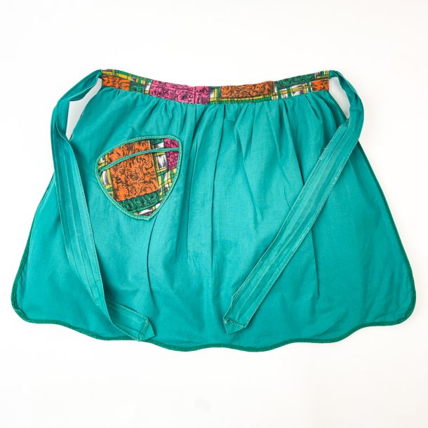 Grne und orange Retro-Schrze