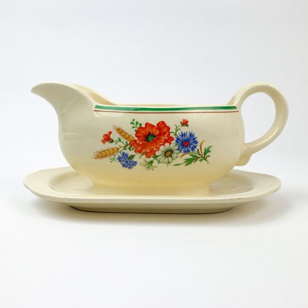 Sauceskl med vilde sommerblomster
