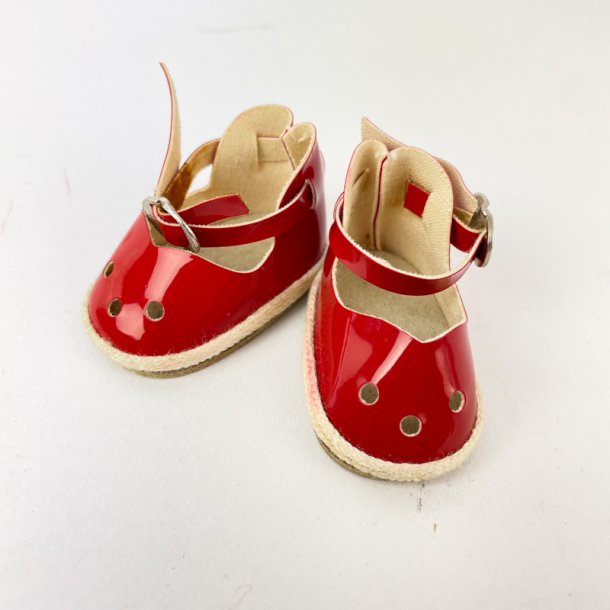 Kleine, rote Vintage-Puppenschuhe