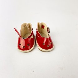 Kleine, rote Vintage-Puppenschuhe
